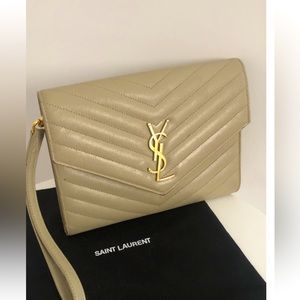 Stunning authentic YSL clutch crossbody one beige and gold.  Worn twice